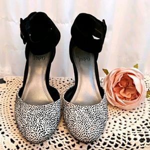 Black and white ankle strap heels